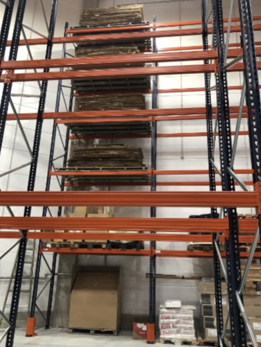 High pallet racks with goods